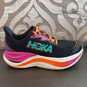 Hoka Skyward X Black Running Shoe with Teal, Orange & Magenta Accents